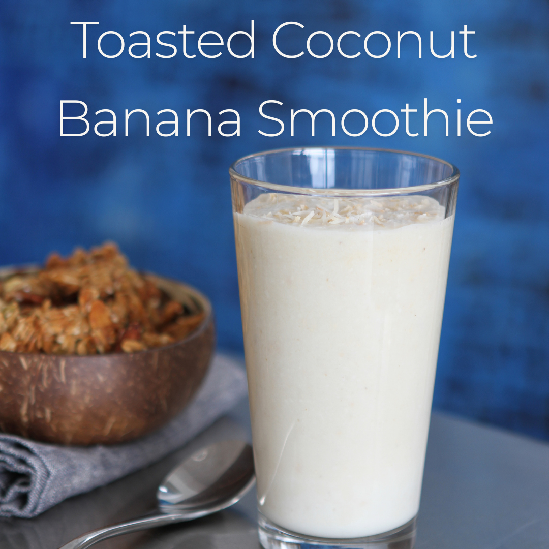 Cup of smoothie with a spoon 
